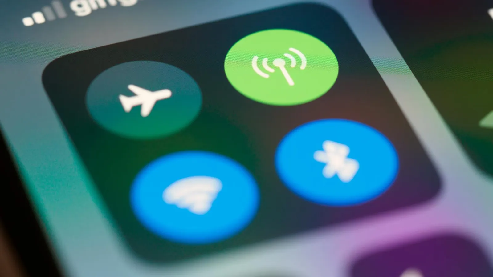 High-resolution close-up of smartphone interface showing control center icons.